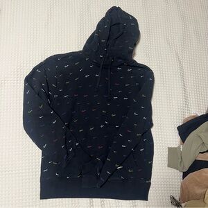 Nike Black Hoodie with Colorful Swoosh Patterns